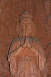 In Buddhism, a bodhisattva is either an enlightened (bodhi) existence (sattva) or an enlightenment-being or, given the variant Sanskrit spelling satva rather than sattva, "heroic-minded one (satva) for enlightenment (bodhi)." Another term is "wisdom-being." It is anyone who, motivated by great compassion, has generated bodhicitta, which is a spontaneous wish to attain Buddhahood for the benefit of all sentient beings.
