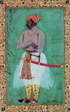 Commissioned by Nuruddin Muhammad Jahangir; fourth Mughal emperor of Hindustan in Northern India; ca. 1620. This courtier was awarded a prestigious title for his valour and military success in the Mughal army. He is garbed in sumptuous clothing; as though standing at court in front of the emperor.