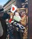 China: A Japanese soldier says goodbye to a young child before boarding a troop train in Manchuria, 1933.