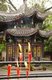 China: Candles burning at Baoguo Si (Declare Nation Temple), at the foot of Emeishan (Mount Emei), Sichuan Province