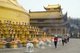 China: Visitors circumambulate the Bodhisattva Puxian statue at the Golden Summit (Jin Ding), Emeishan (Mount Emei), Sichuan Province