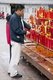 China: Lighting candles at the Golden Summit (Jin Ding), Emeishan (Mount Emei), Sichuan Province